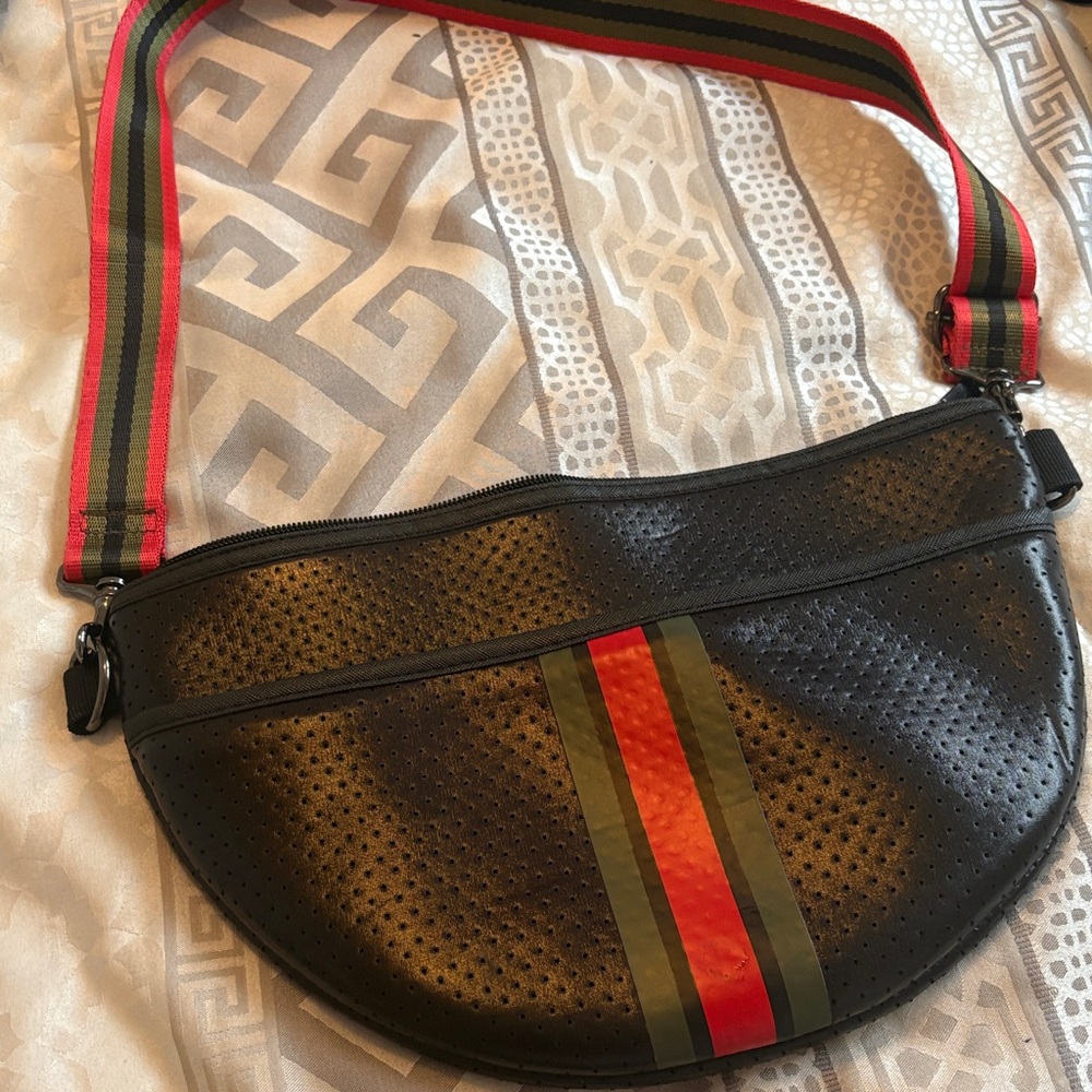 HAUTE SHORE Black Perforated Bag with Red and Green Stripes